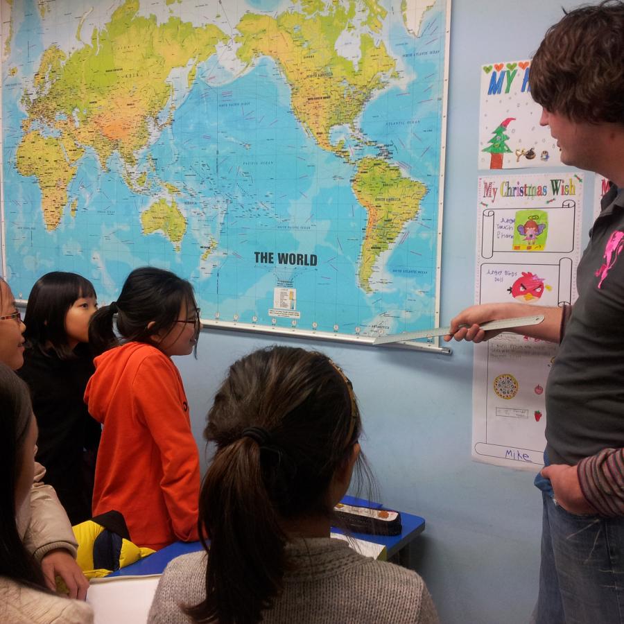 Pointing to world map