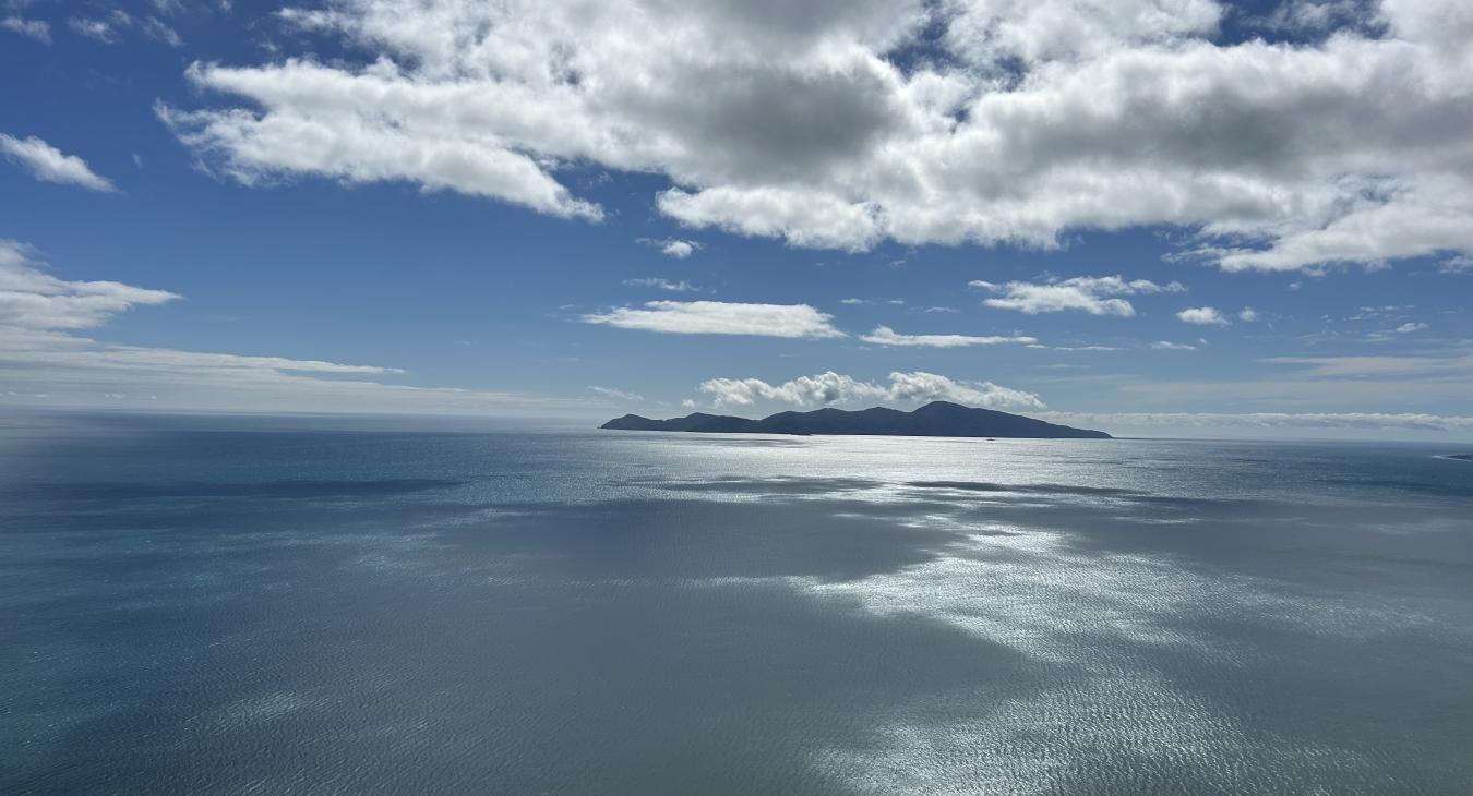Viewing the ocean high from the mountain
